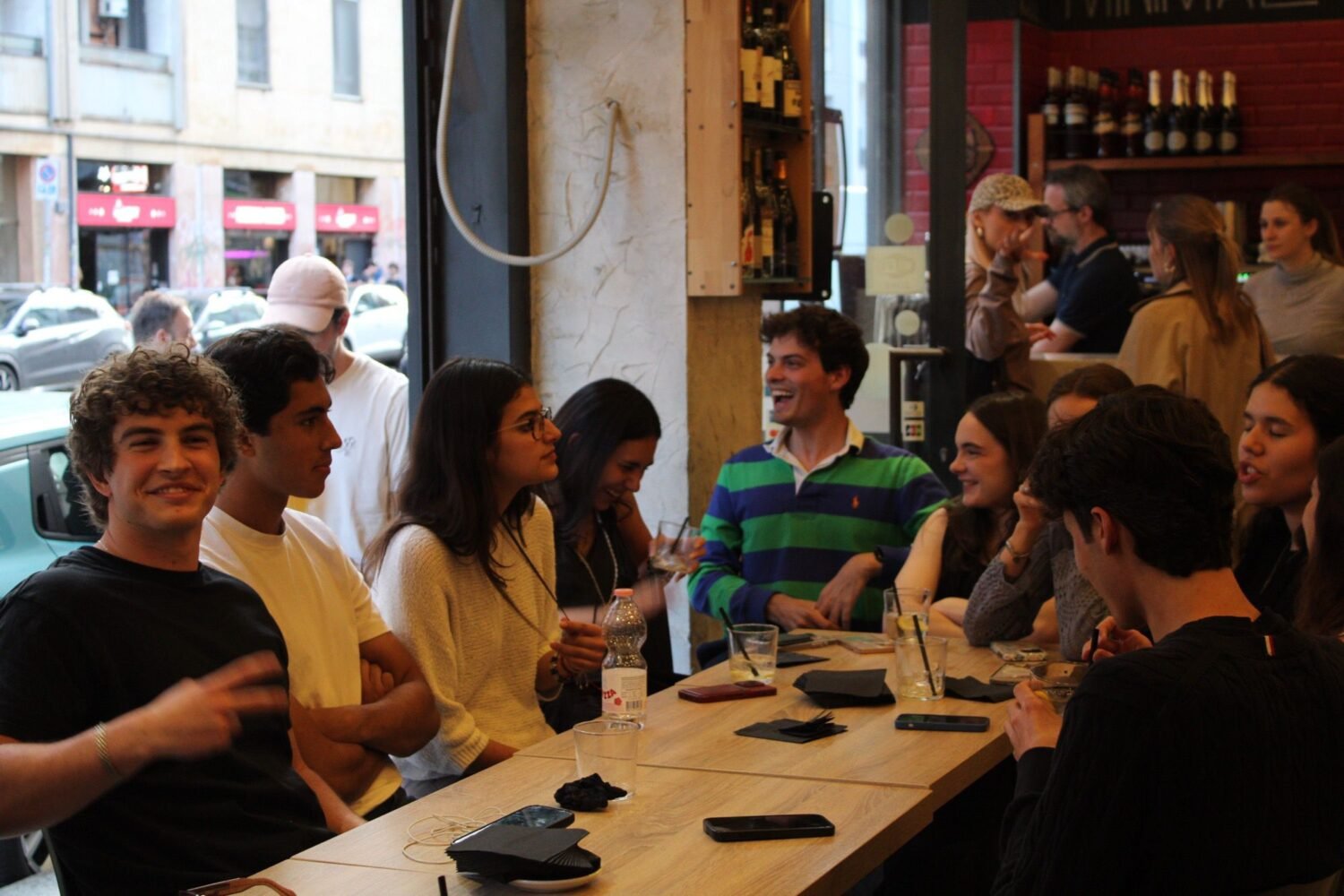 Members talking over drinks at an association aperitivo